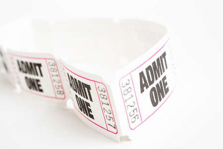 A macro or close-up shot of a strip of generic white sequentially numbered admittance paper ticket.の写真素材