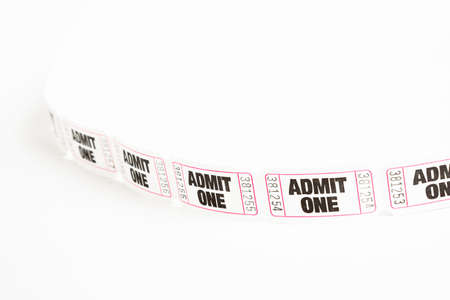 A macro or close-up shot of a strip of generic white sequentially numbered admittance paper ticket.の写真素材