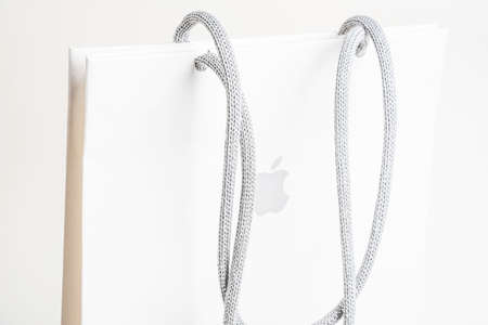 Vidalia, Georgia, USA / June 29, 2019: A close-up product studio shot of Apple retail storeâs medium size white paper bag set on white background.のeditorial素材