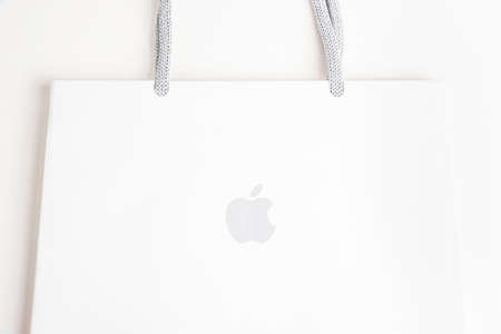 Vidalia, Georgia, USA / June 29, 2019: A close-up product studio shot of Apple retail storeâs medium size white paper bag set on white background.のeditorial素材