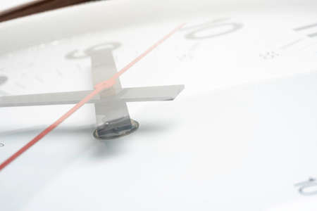 A close-up or macro shot of a broken, dirty and dusty old clock face.