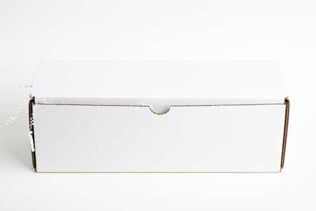 A close-up studio shot of a generic closed white packaging box set on a plain white background.
