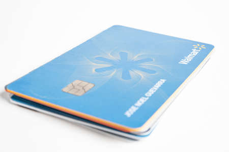 Vidalia, Georgia / USA - June 29, 2019: A close-up studio shot of the Walmart credit card set on a...