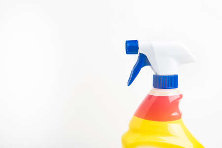 A close-up of the top portion of a red, white, and blue liquid spray plastic dispenser bottle set on a plain white background.の写真素材
