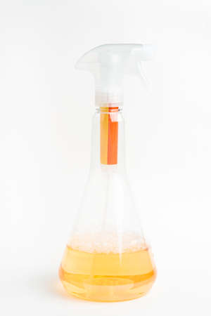A product shot of the entire transparent liquid spray plastic dispenser bottle set on a plain white background.の写真素材