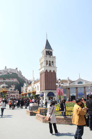 EVERLAND, YONGIN, KOREA - APRIL 06 : The unidentified group of tourists are queuing and be happy at the entrance way on april  06, 2011 at Everland, Yongin, Korea.のeditorial素材