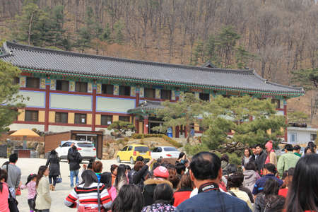 WAUJEONGSA TEMPLE,SUWON,KOREA-APRIL 06 :The unidentified tourists are travelling and Temple to see the beauty of the economic treatment of the large and worship God. on april 06, 2011 at waujeongsa temple, suwon, Korea. のeditorial素材