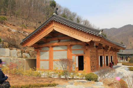 WAUJEONGSA TEMPLE,SUWON,KOREA-APRIL 07:The unidentified tourists are travelling and Temple to see the beauty of the economic treatment of the large and worship God. on april 07, 2011 at waujeongsa temple, suwon, Korea. のeditorial素材