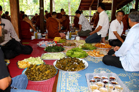 Sakon Nakhon,Thailand - October 30,2011 : Unidentified Thai people monks on Kathin tradition in the morning on Kathin tradition.  on october 30, 2011 in sakon nakhon, Thailand.のeditorial素材