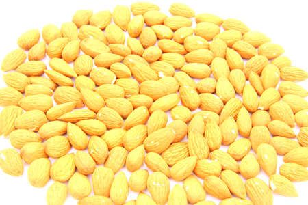 nuts almonds on a white backgroundの写真素材
