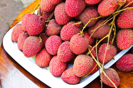Closeup of freshly produced bunch of ripe and  Lychee fruitsの写真素材