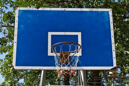 Basketball goal net on blue skyの写真素材