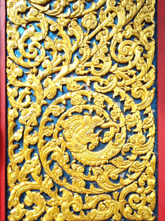   Buddhist decoration on a door in a temple                  の写真素材