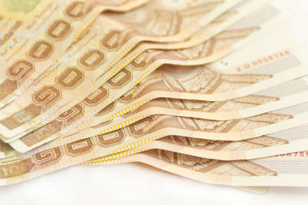 Thai money isolated on white backgroundの写真素材