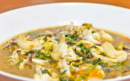 Fried squid with basil の写真素材