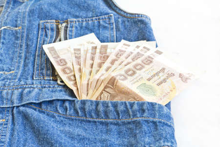 1000 baht bill in jean pocket,Thailand moneyの写真素材