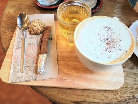 Coffee cup on wooden table in coffee shopの写真素材