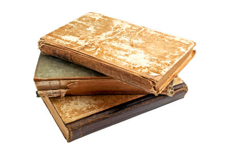 Pile of old books isolated on white backgroundの写真素材