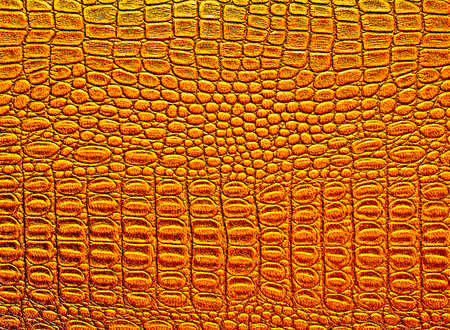 Gold background, texture of crocodile skinの写真素材