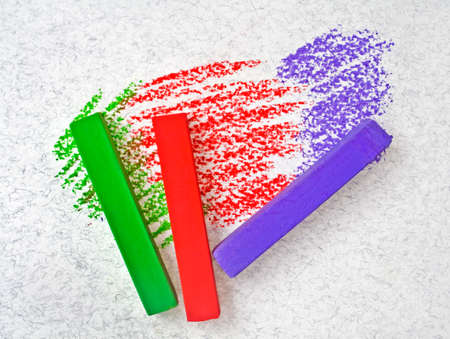 Colorful chalk pastels on a paperの写真素材