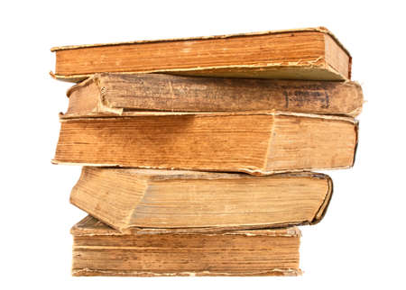 Stack of old books on a white backgroundの写真素材