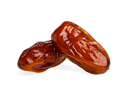 Dried dates fruits isolated on white backgroundの写真素材
