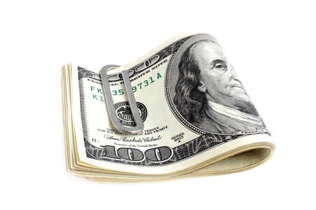 Money clip with dollars on a white backgroundの写真素材