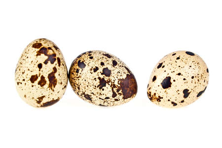 Group of quail eggs, isolated on white backgroundの写真素材