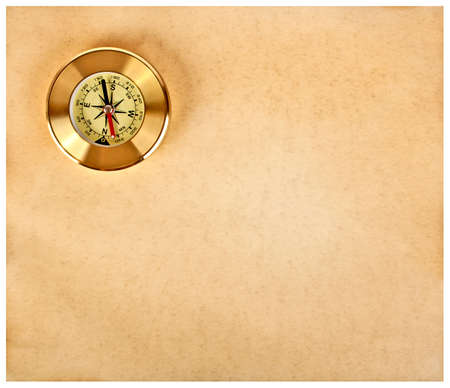 Old paper texture with golden compass