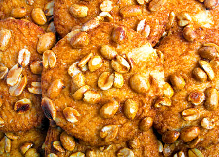 Close-up of delicious cookies with peanuts background