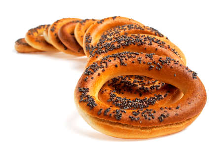 Bagels with poppy seeds isolated on white backgroundの写真素材