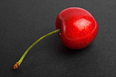 Cherry isolated on a black backgroundの写真素材