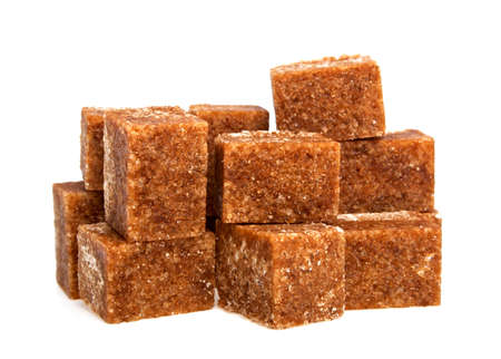Brown sugar cubes on a white backgroundの写真素材