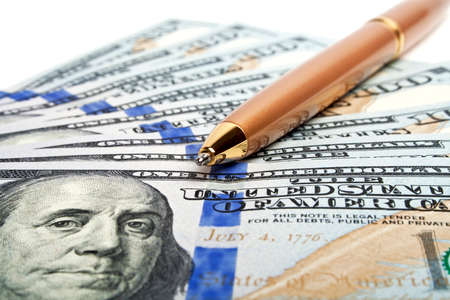 Business concept - money and penの写真素材