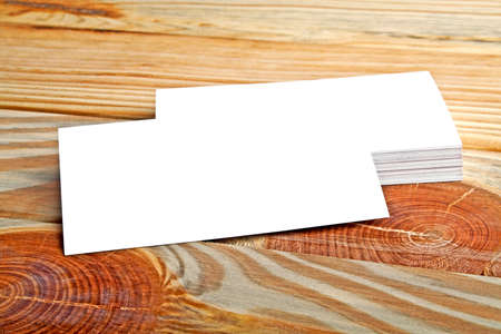 Business card on wooden backgroundの写真素材