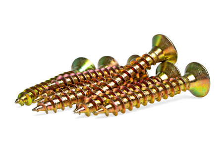 Golden screws on white background