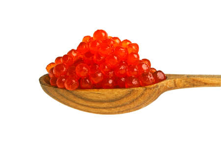 Red caviar with wooden spoon on white backgroundの写真素材