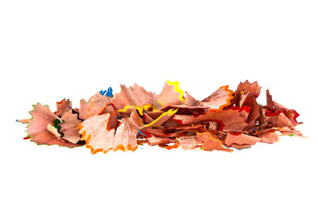 Shavings from multicolored pencils on white backgroundの写真素材
