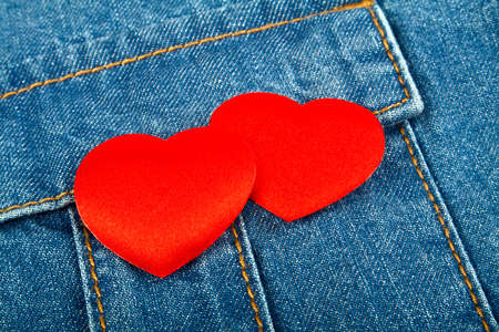 Red hearts in jeans pocket