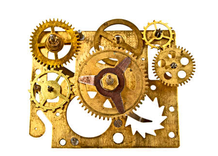 Old clock mechanism with gears isolated on white background, close up