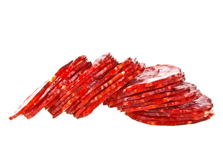 Salami slices isolated on a white backgroundの写真素材