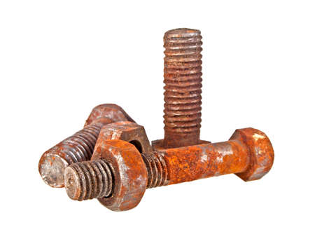 Old rusty bolts and screw-nuts isolated on white backgroundの写真素材