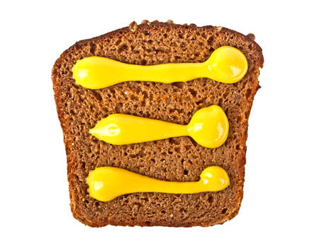 Rye bread slice and mustard isolated on white backgroundの写真素材