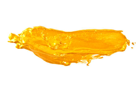 Strokes of golden paint isolated on white backgroundの写真素材