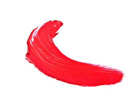 Red color lipstick stroke on white backgroundの写真素材