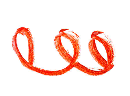 Red color lipstick stroke on white backgroundの写真素材