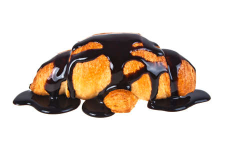 Fresh croissant with hot chocolate on a white backgroundの写真素材