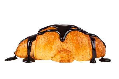 Fresh croissant with hot chocolate on a white backgroundの写真素材