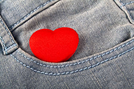 Red heart in jeans pocketの写真素材
