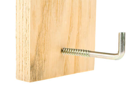 Screw hook screwed into the wooden plankの写真素材